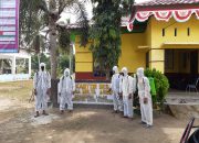 Cegah Penyebaran Virus Covid-19, Relawan dan Pemdes Mulya Agung lakukan penyemprotan disinfektan