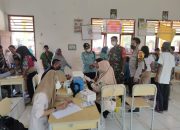 Pemdes Tampang Baru Laksanakan Vaksinasi, Ikut Sertakan Anak Didik