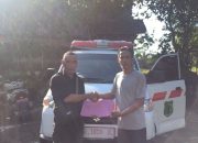 Kepala Desa Tanjung Kaputaran Serahkan Mobil Ambulance Kepada Perangkat Desa