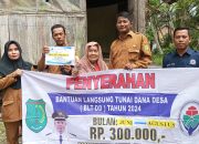 Pemdes Tri Mulya Agung Salurkan BLT-DD Periode Juli-September Tahun 2024