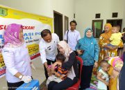 TP-PKK Sido Mukti Laksanakan Imunisasi PIN Polio