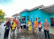 Pemdes Dan TP-PKK Desa Ramba Jaya Berikan Bantuan Sembako Terhadap Masyarakat Terdampak Banjir
