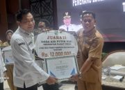 Desa Air Putih Ulu Terima Penghargaan Dari Bupati Muba H.M.Toha,SH