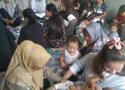 TP-PKK Desa Sindang Marga Melaksanakan Kegiatan Posyandu Balita Dan PMT